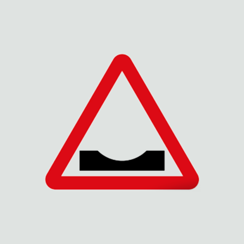 Warning of a "dip" in road ahead